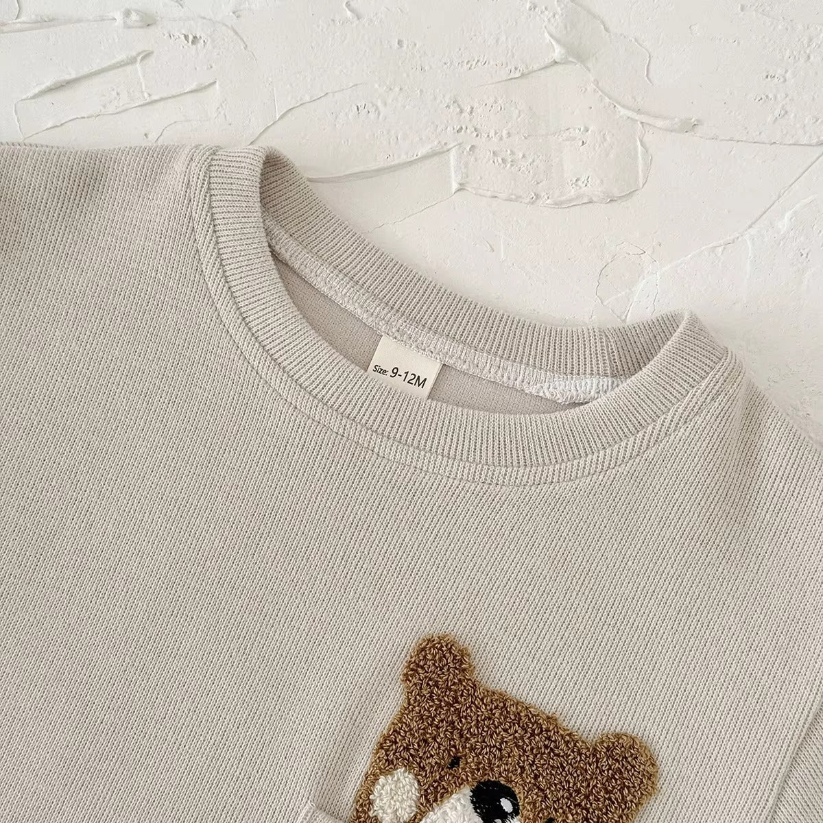 Conjunto Bebê Malha Ursinho no Bolso — Bege