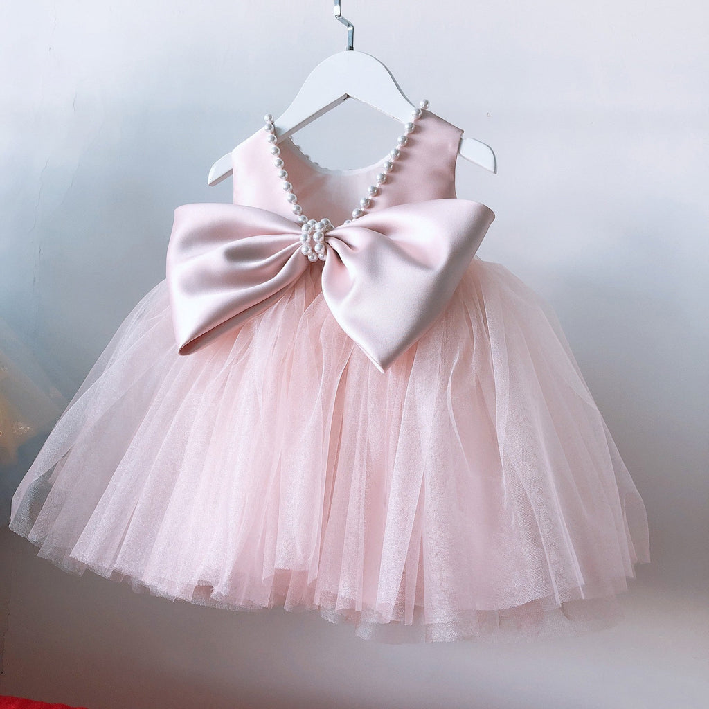 Vestido Infantil de Festa com Laço Grande e Detalhes em Pérolas
