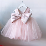 Vestido Infantil de Festa com Laço Grande e Detalhes em Pérolas